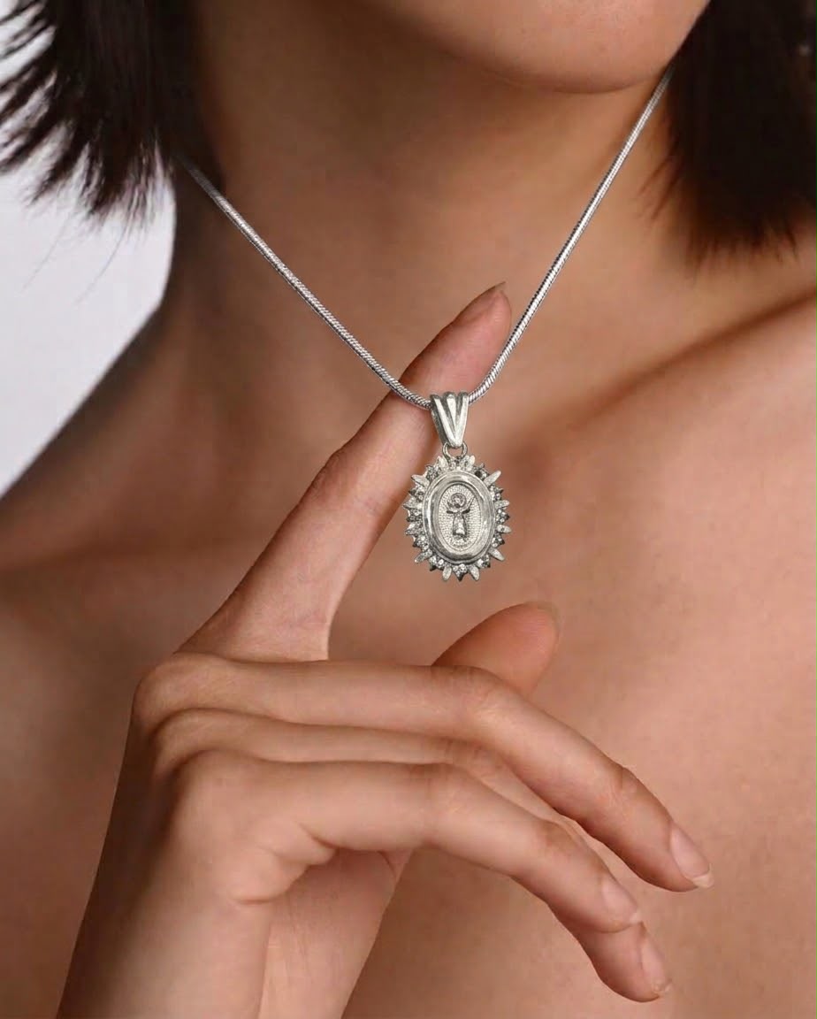 Dijes de plata para dama